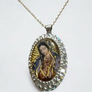 VIRGEN DE GUADALUPE CRYSTAL OVAL PENDANT NECKLACE 
Radiant & spiritual beauty